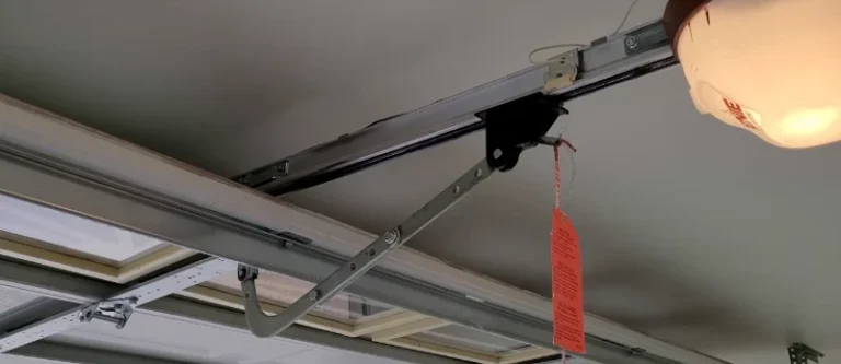 Garage door track and opener rail system